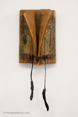 Henigman Bruce - Red Buttons, Encaustic, wood beads, brass, chicken bones & string on a book, 8"h x 3.5"w x 2.5"d SOLD Kim Henigman Bruce - Red Buttons