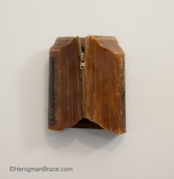 Kim Bruce - Zipper Up, Encaustic medium & zipper on a book, 4.5"h x 4.25"w x 2"d Kim Henigman Bruce - Zipper Up
