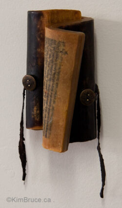 Henigman Bruce - Button Up, Encaustic & found objects on a book, 7"h x 3"w x 2"d, SOLD Henigman Bruce - Button Up