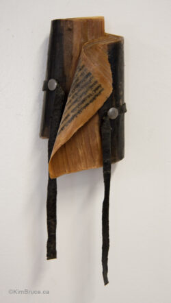 Henigman Bruce - Ties II, Encaustic medium, encaustic, Tacks & ties on a book, 9.25"h x 3"w x 2.5"d overall Henigman Bruce - Ties II