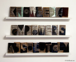 Knowledge Empowers Absolutely, Encaustic on books, 48"W x 33"H x 4"D Kim Bruce - Knowledge