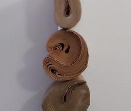 Uncommon commas, 14x5x4.5 inches Encaustic and zippers on books Kim Bruce - Uncommon commas