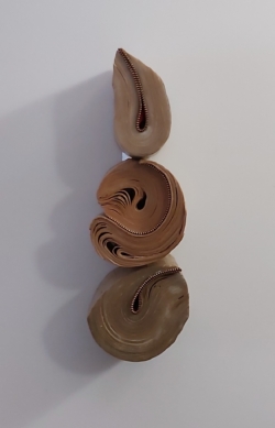 Uncommon commas, 14x5x4.5 inches Encaustic and zippers on books Kim Bruce - Uncommon commas